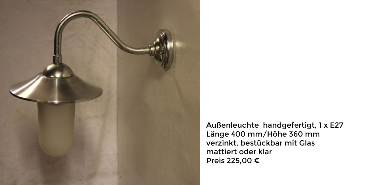 Wandleuchte in handwerklicher Schmiedearbeit